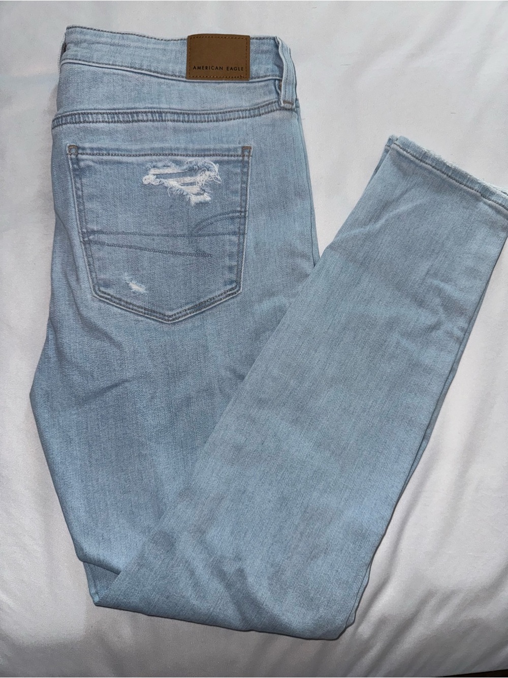 American Eagle Outfitters Light Blue Distressed Skinny Jeans
